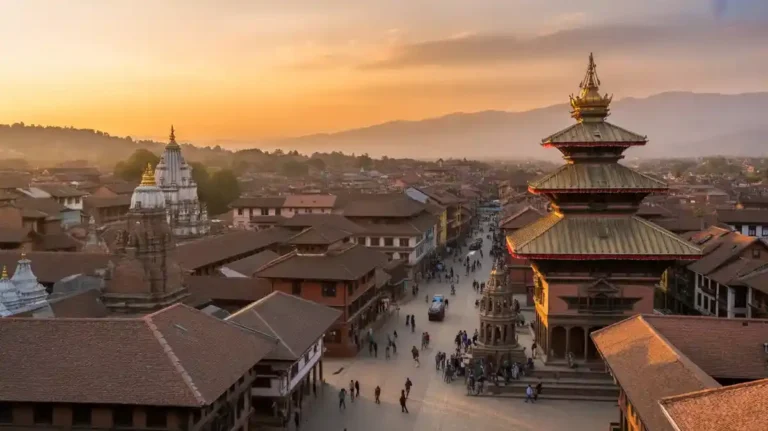 A scenic aerial view of Bhaktapur Durbar Square at sunset showing temples and traditional architecture.
